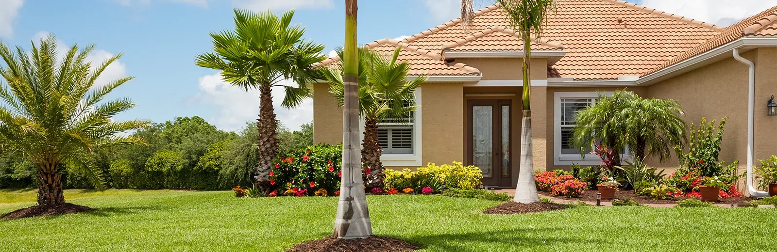 Florida home with healthy green front lawn